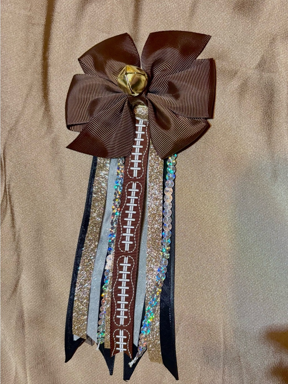 Handcrafted Brown Bow with Gold Bell and Rhinestone Streamers